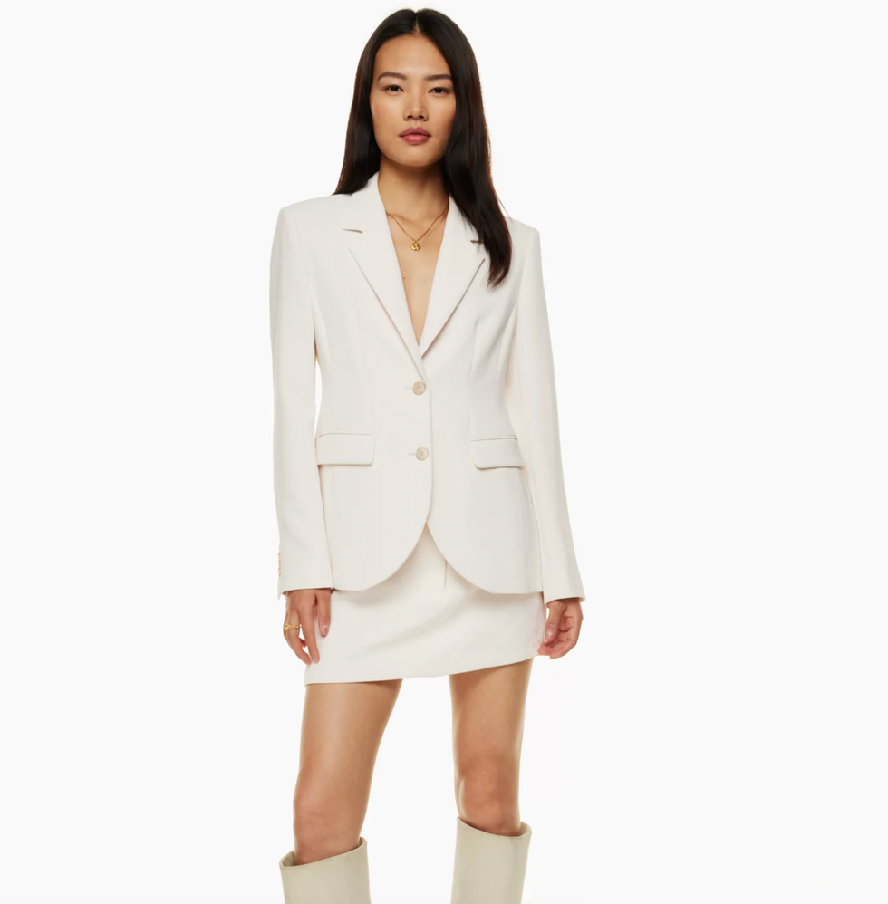 An Aritzia model wearing the Signature Blazer.