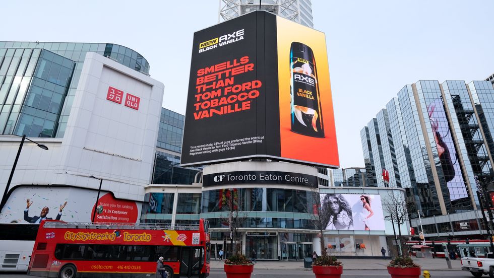 An AXE billboard at CF Toronto Eaton Centre announcing the outcome of the blind scent test.