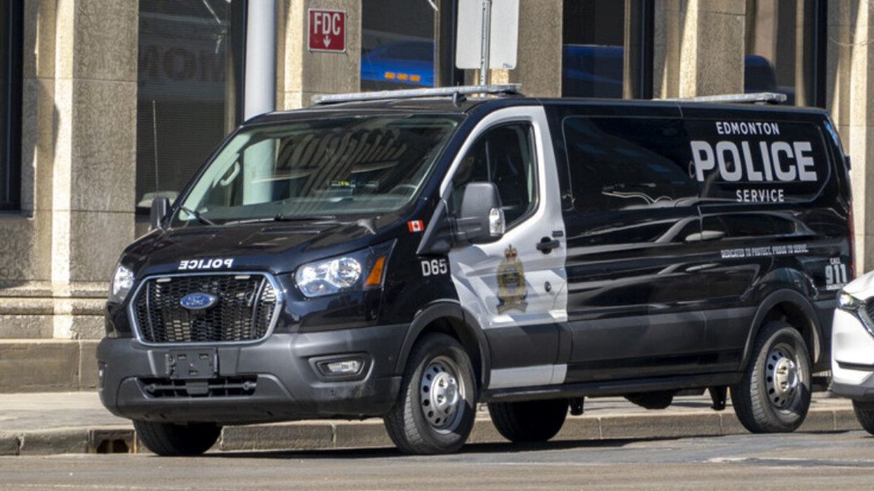 An Edmonton Police Service van on a street.