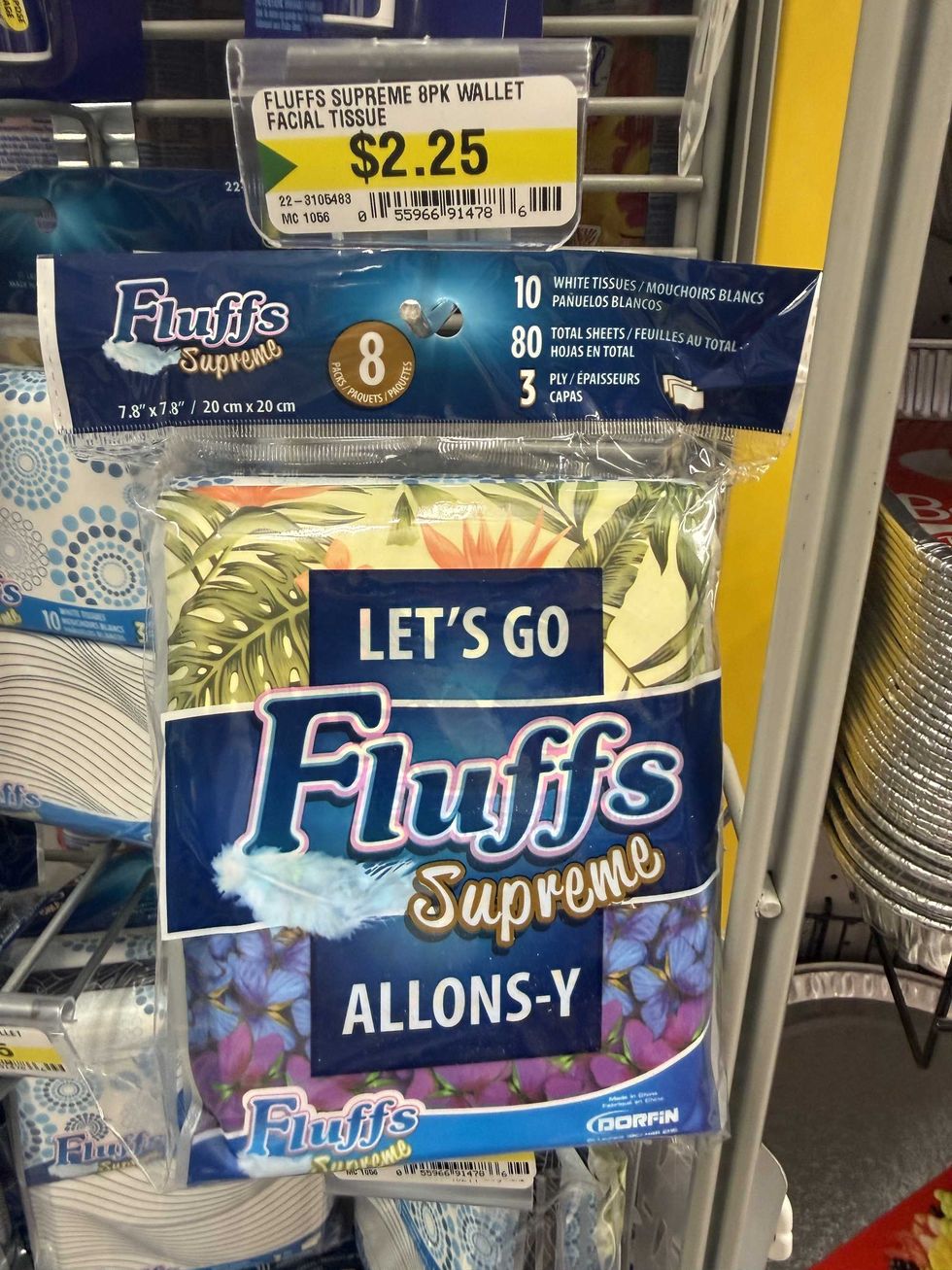 An eight pack of facial tissues for sale at a store.