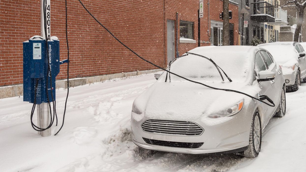 An electric car charges in Montreal.