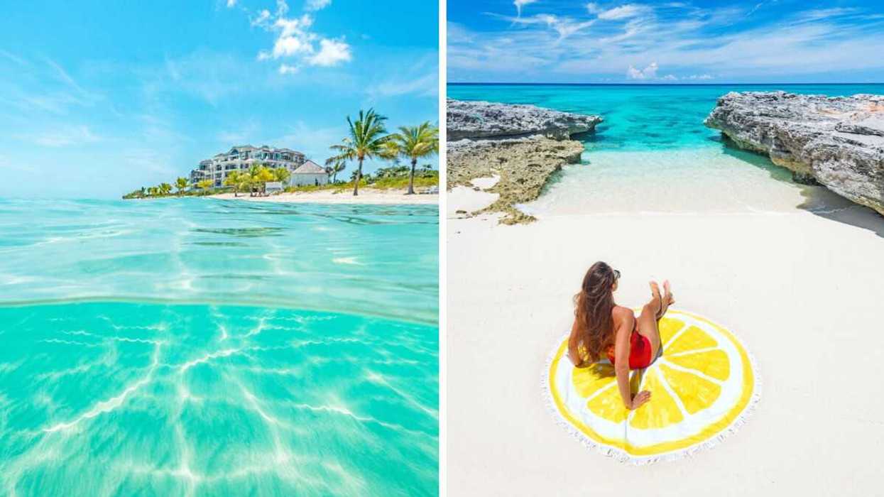 An island with white sand and turquoise water.