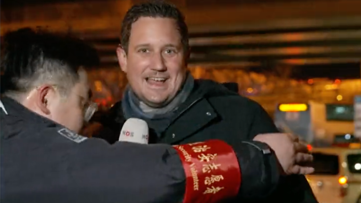 An Olympic Guard Yanked A Reporter Off Live TV & China Still Hasn't Said What He Did Wrong