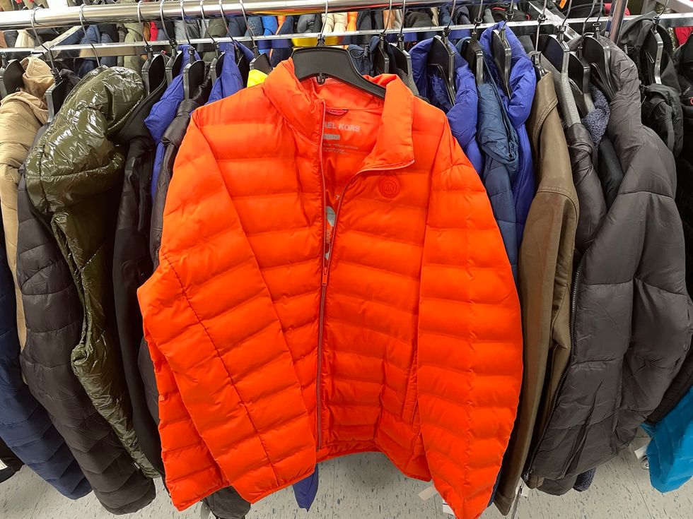 An orange Michael Kors jacket.