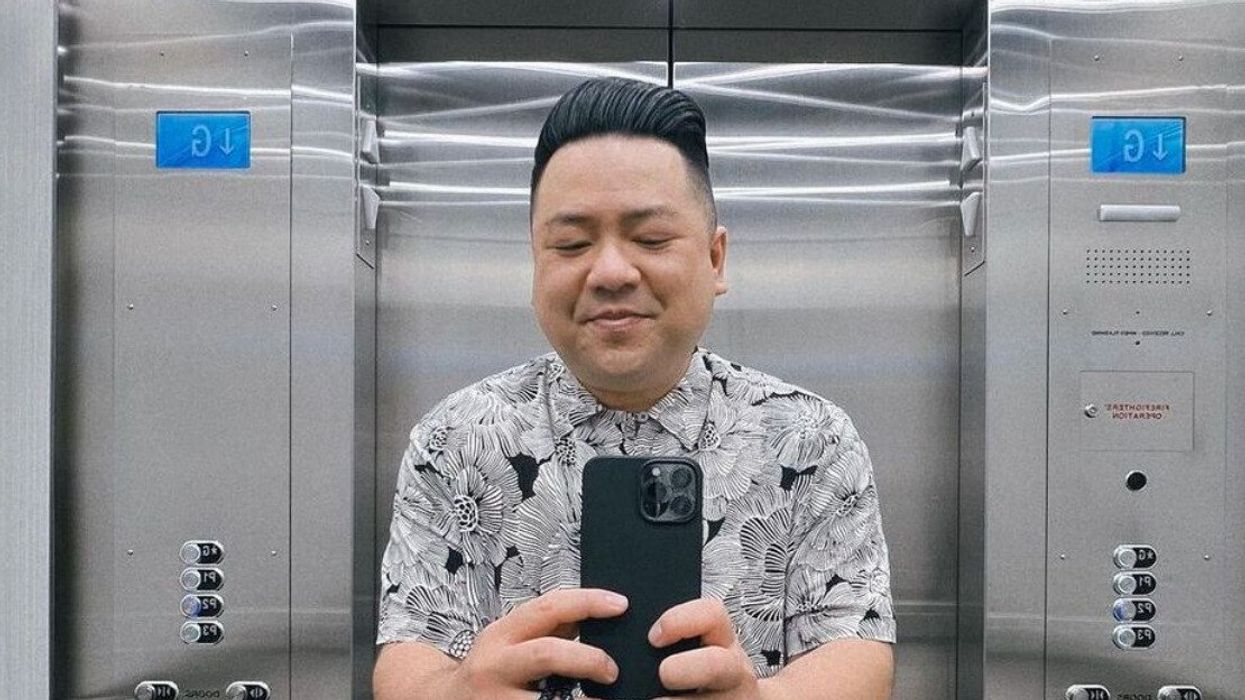 Andrew Phung in an elevator.