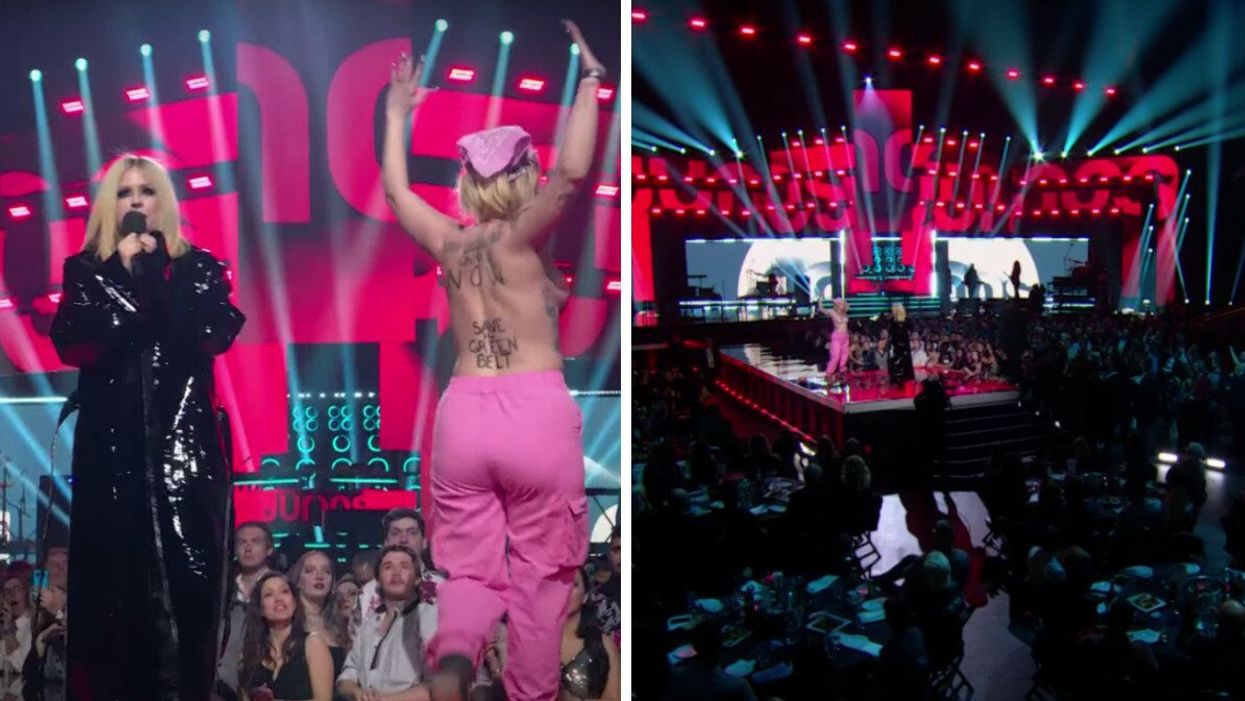 Avril Lavigne speaking at the 2023 JUNOS while someone crashed the stage topless.