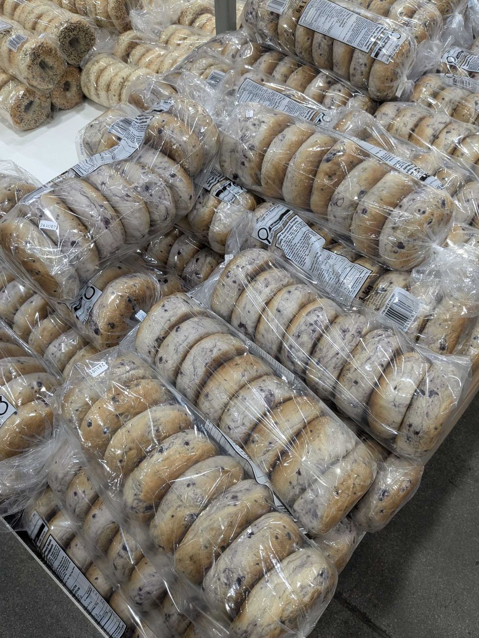 Bags of bagels on a shelf at Costco