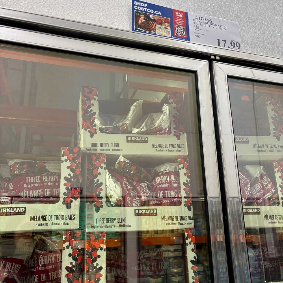 bags of Kirkland Signature frozen berry blend in freezer at costco