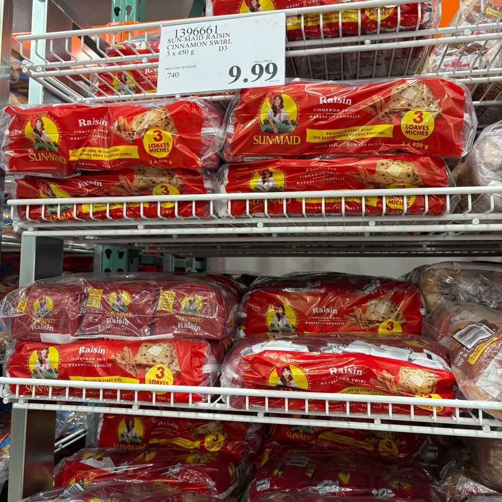 bags of sun maid raisin cinnamon swirl bread on racks at costco
