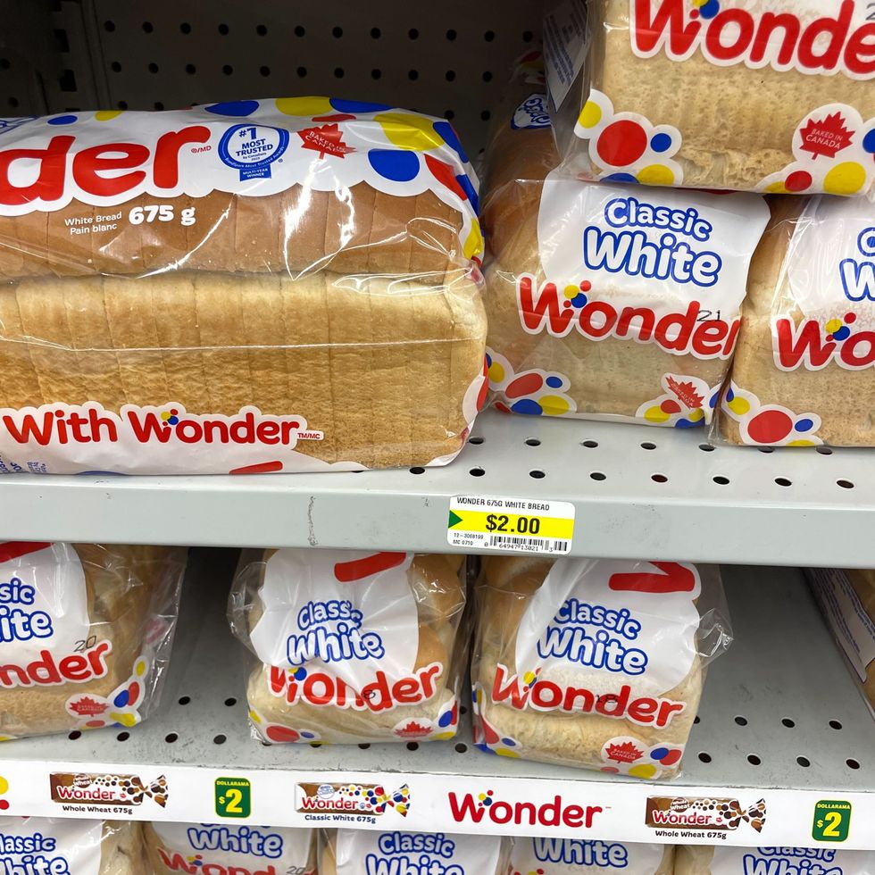 bags of wonder bread loaves on shelves at dollarama