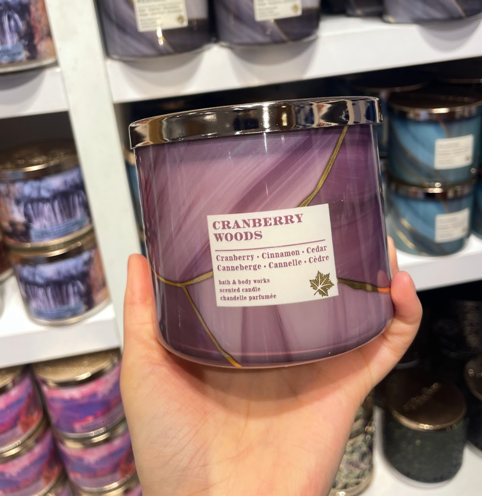Bath & Body Works candle "Cranberry Woods."