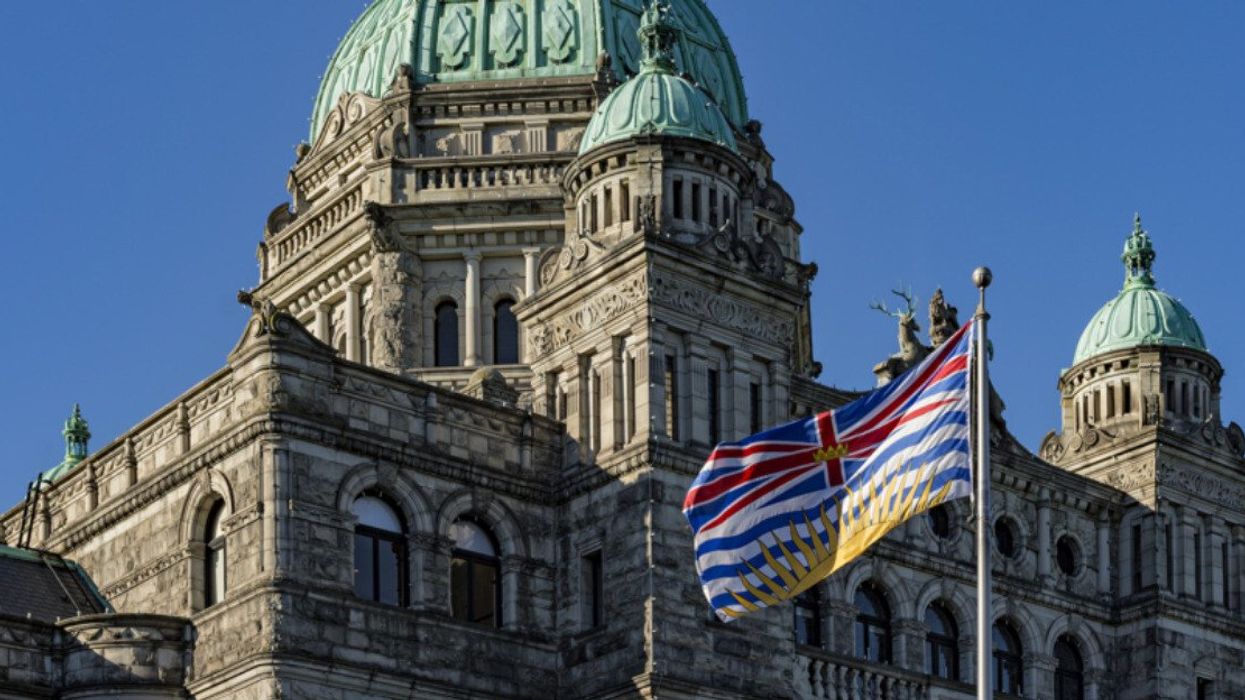 BC Parliament Building and flag.