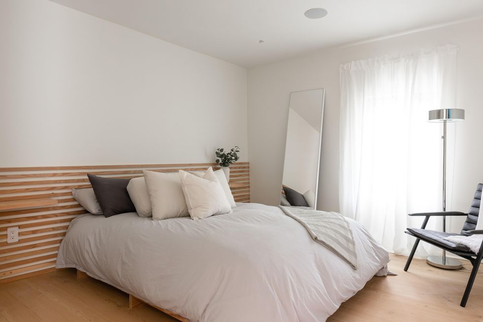 Bedroom with custom wall.