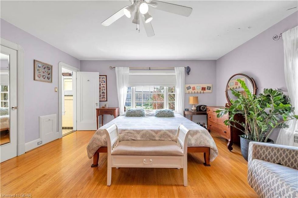 Bedroom with purple walls.