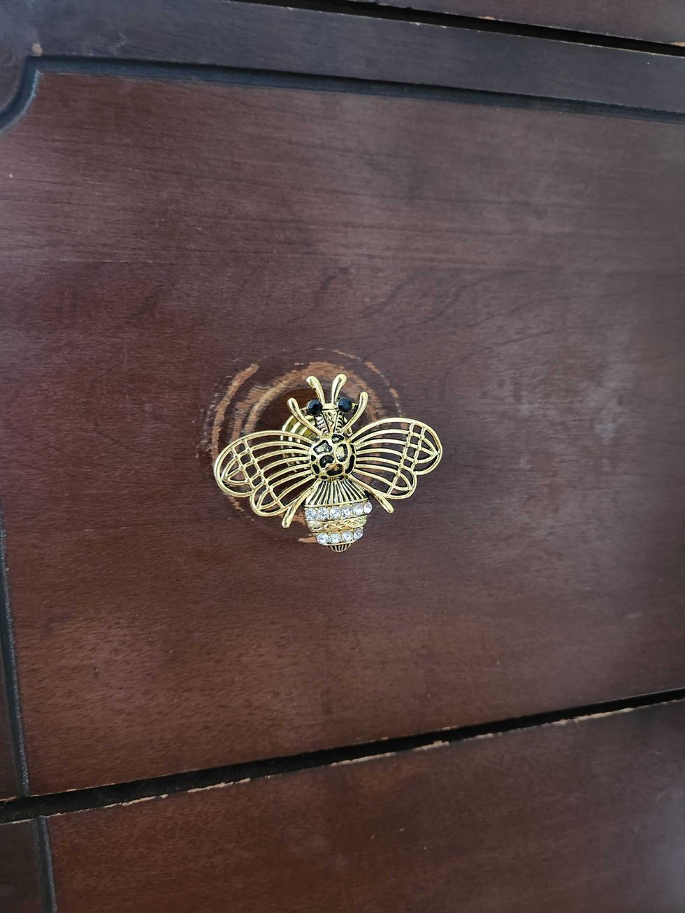 Bee-shaped dresser knobs.