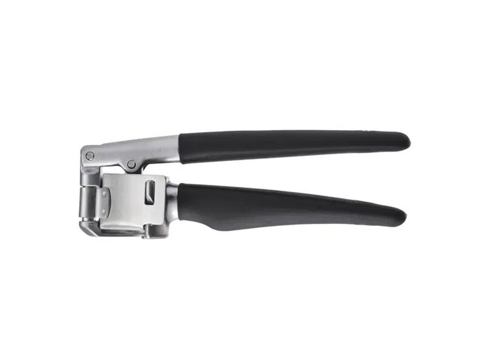 Black and silver garlic press from IKEA.