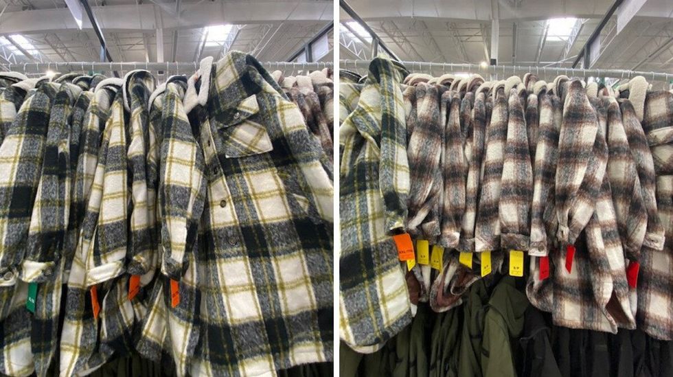 Black, green and white plaid jackets on hangers at Costco.
