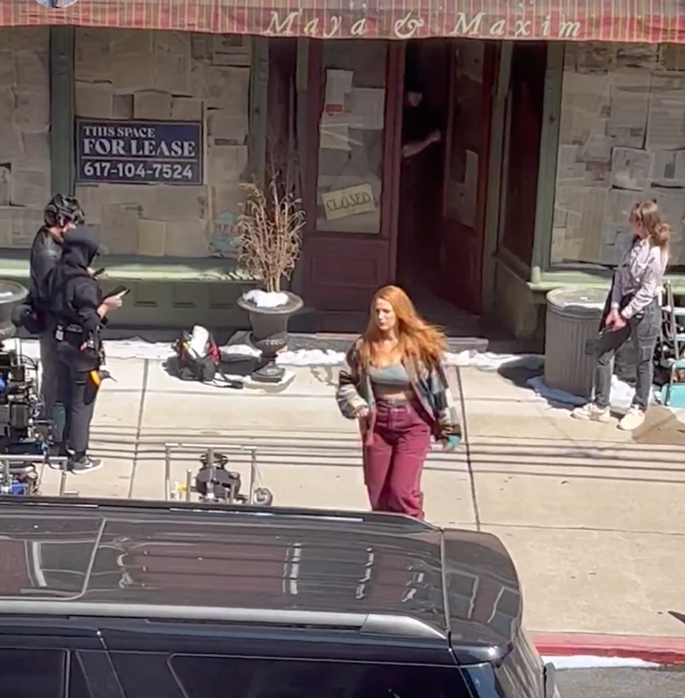 Blake Lively walking on set.