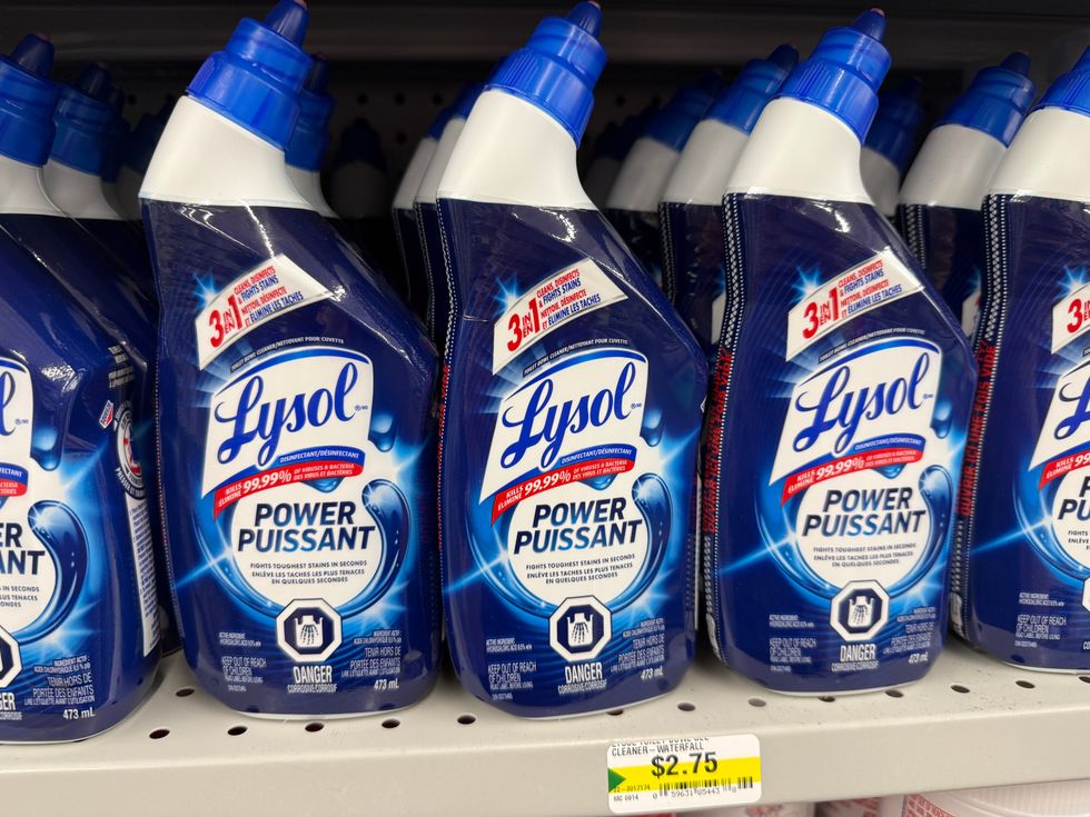 Blue and white bottles on a store shelf.