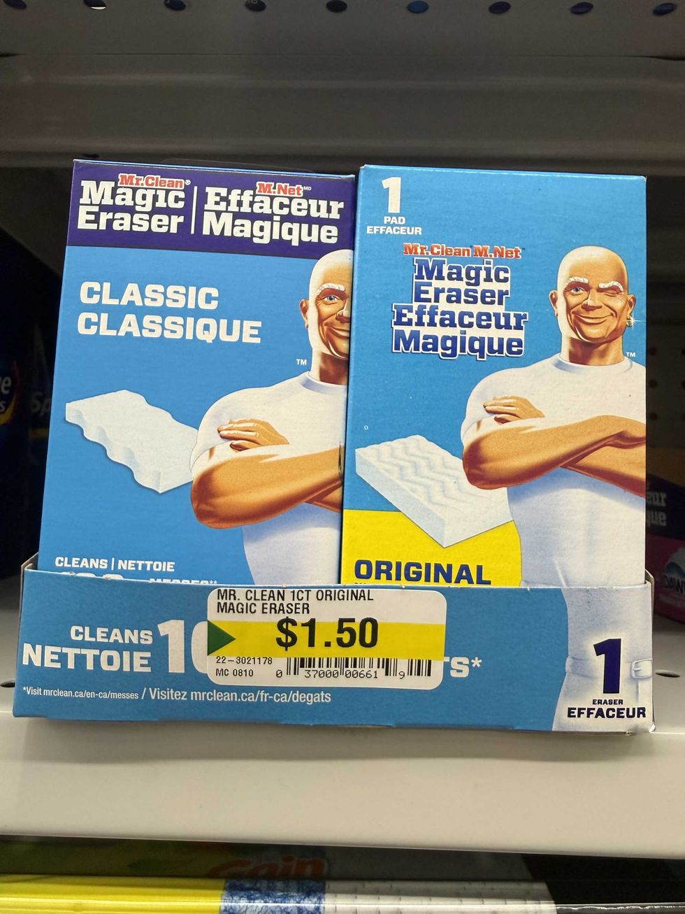 Blue boxes with a picture of a bald man in a white T-shirt and a label reading Mr. Clean Magic Eraser.