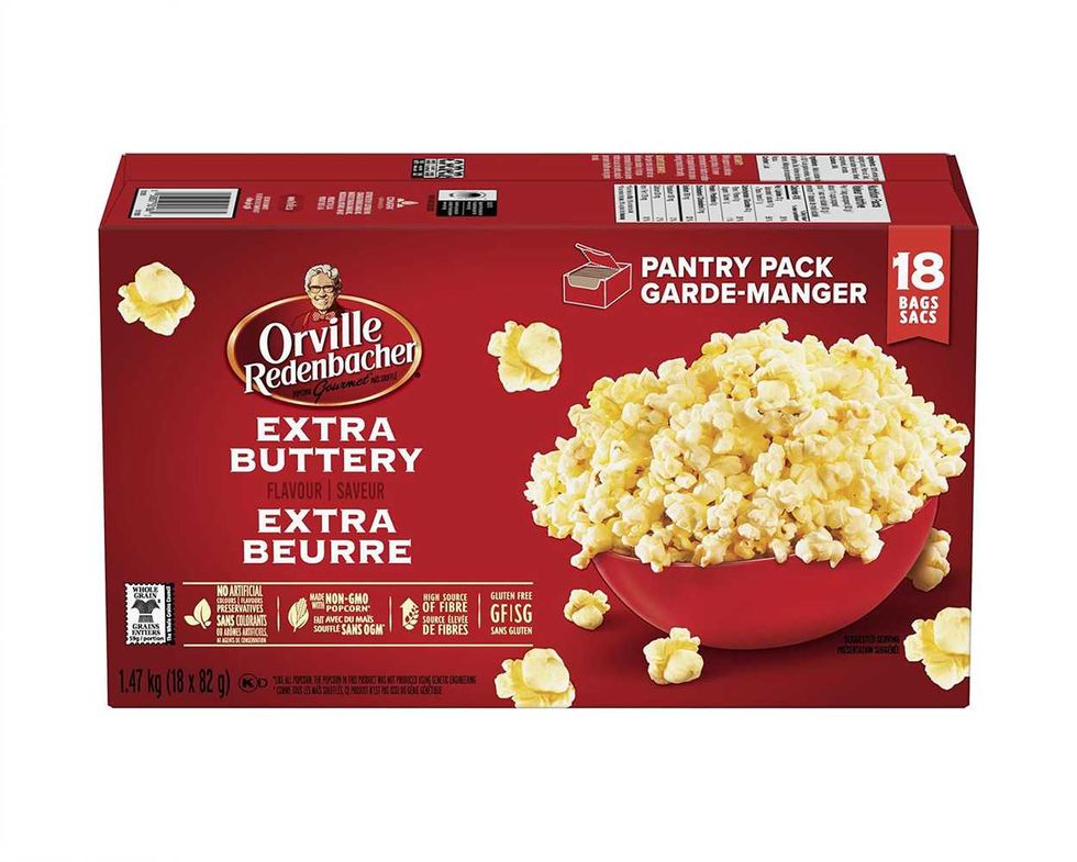 Bo\u00eete de 18 sacs de popcorn \u00e0 saveur d'extra beurre d'Orville Redenbacher.