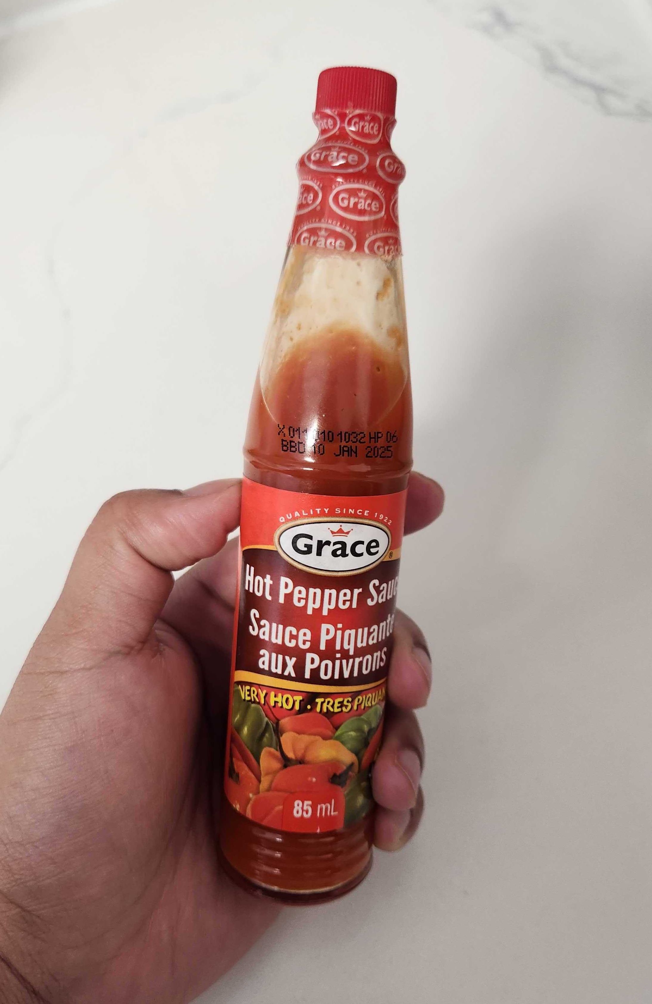 bottle of Grace Hot Pepper Sauce.