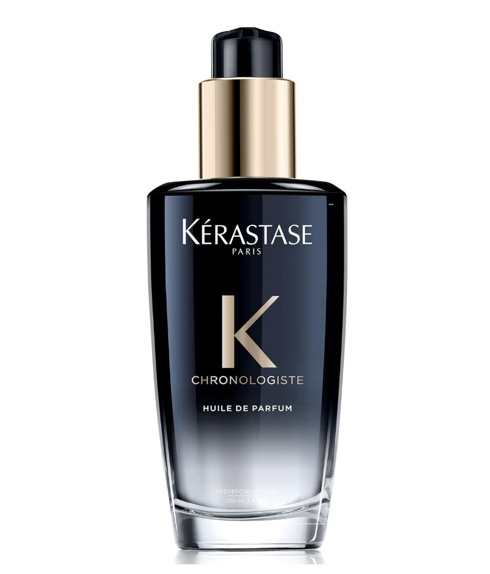 Bouteille d'huile de parfum de \u200bK\u00e9rastase noire et or Chronologiste.