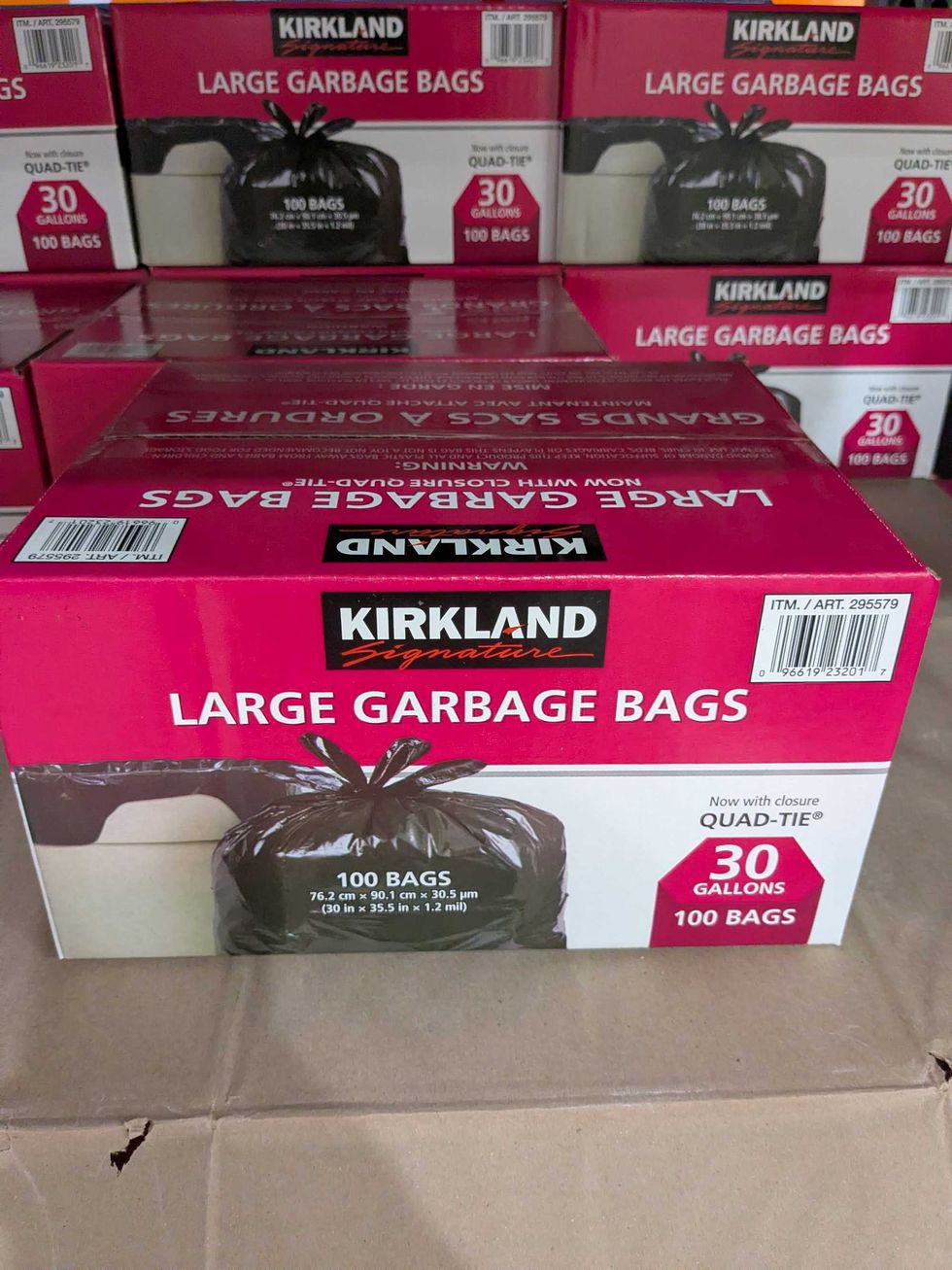 Box of large garbage bags on a shelf