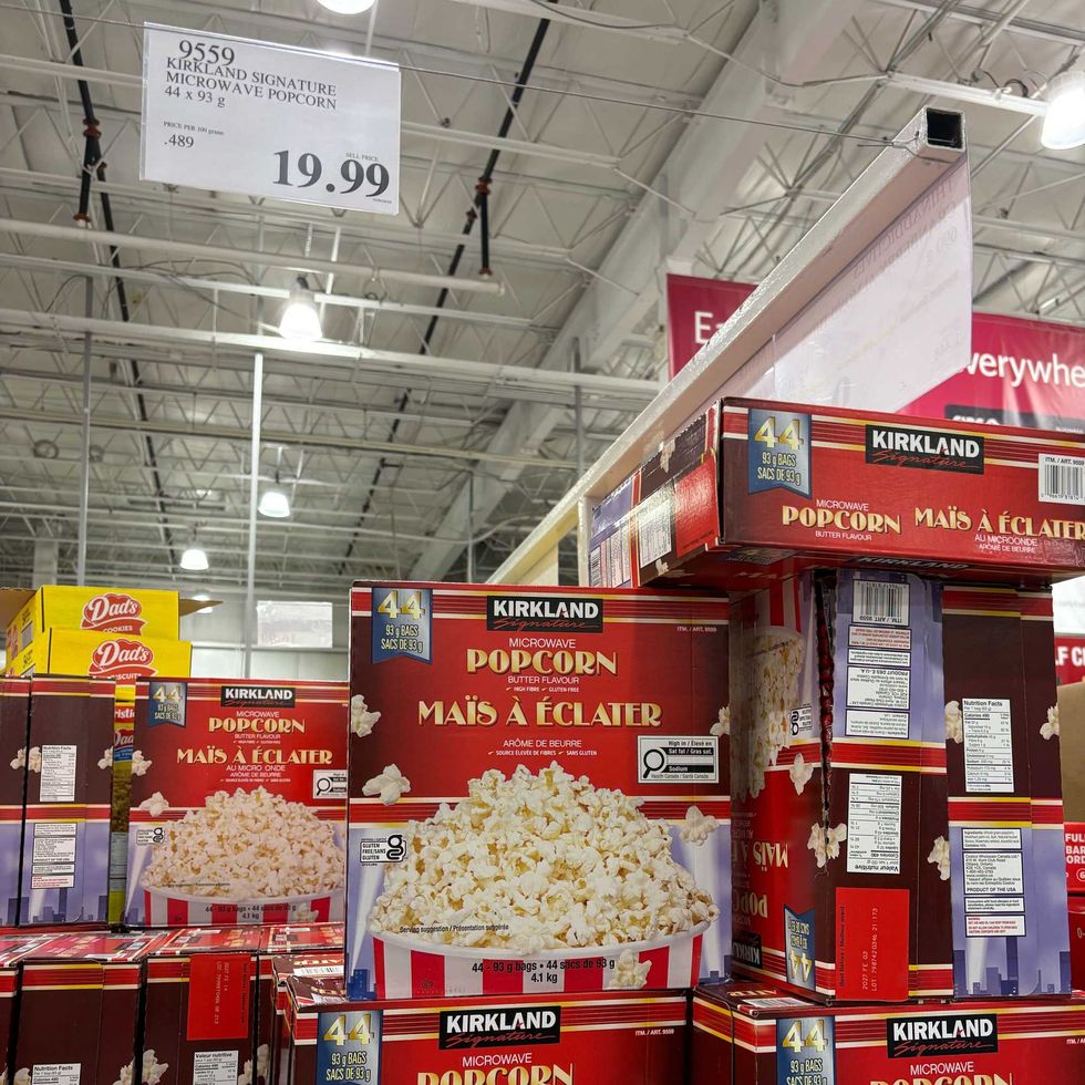 boxes of Kirkland Signature microwave popcorn at costco