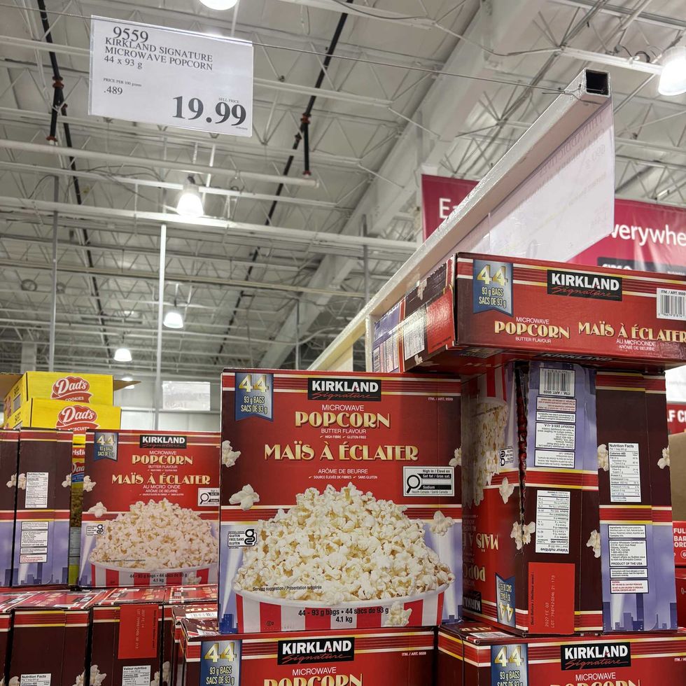 boxes of Kirkland Signature microwave popcorn at costco