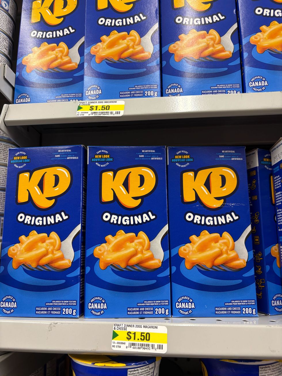 boxes of kraft dinner on shelves at dollarama