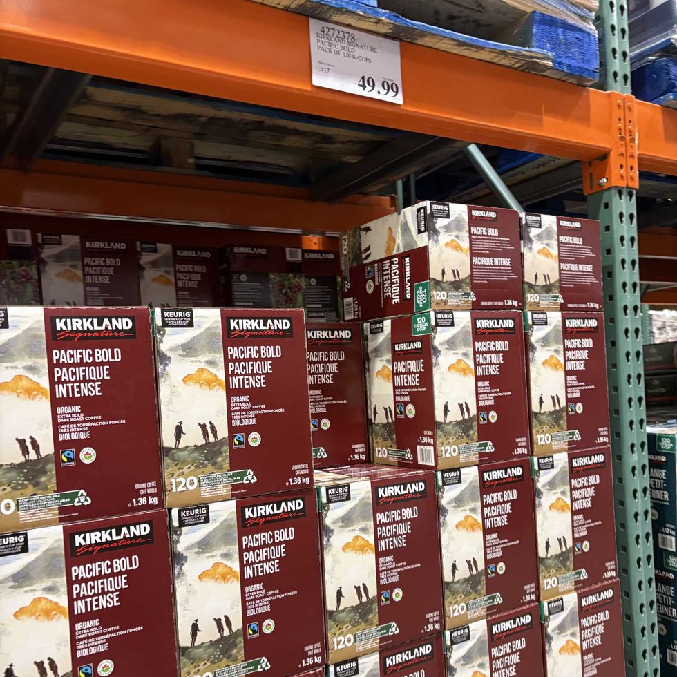 boxes of \u200bKirkland Signature Pacific Bold dark roast coffee pods at costco