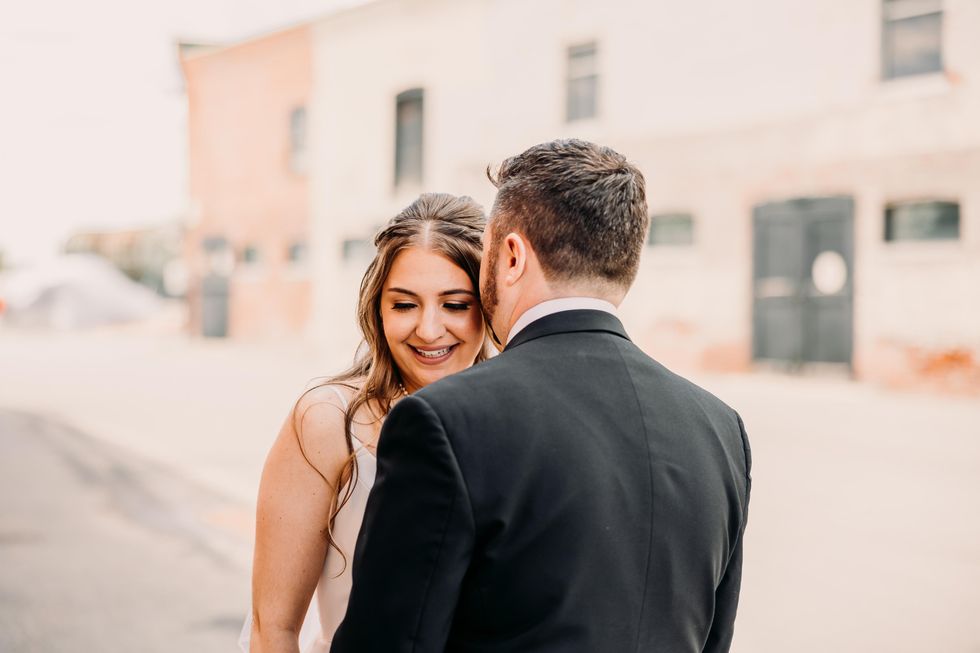 Bride and groom sharing a quiet moment during a first look in Ottawa.