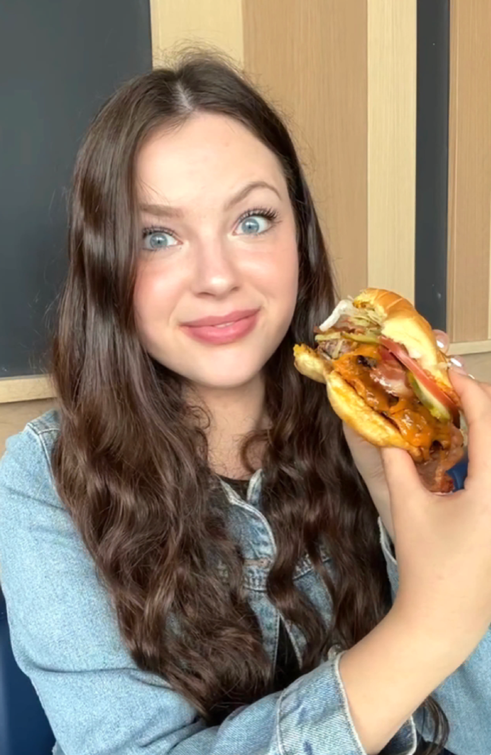 Brooke Houghton with a burger.