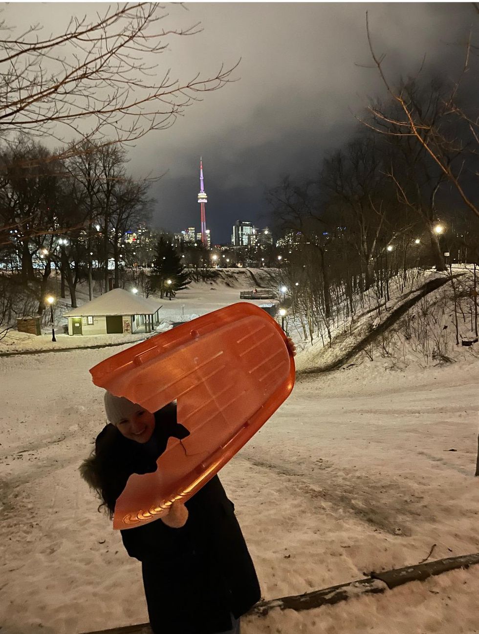 Brooke Houghton with a sled at Trinity Bellwoods Park.