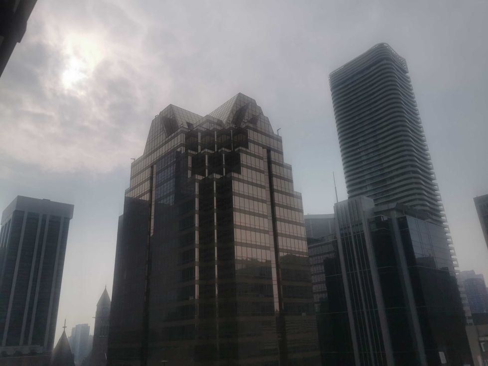 buildings in toronto under a smoky sky