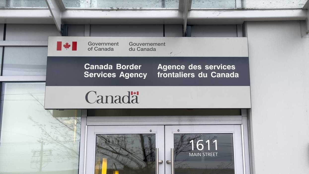 canada border services agency sign with canada logo on exterior of building