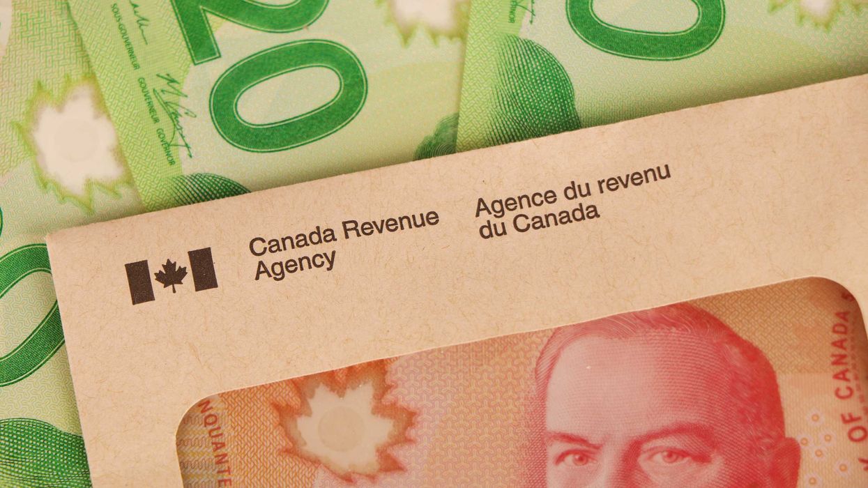 Canada Revenue Agency envelope and Canadian money.