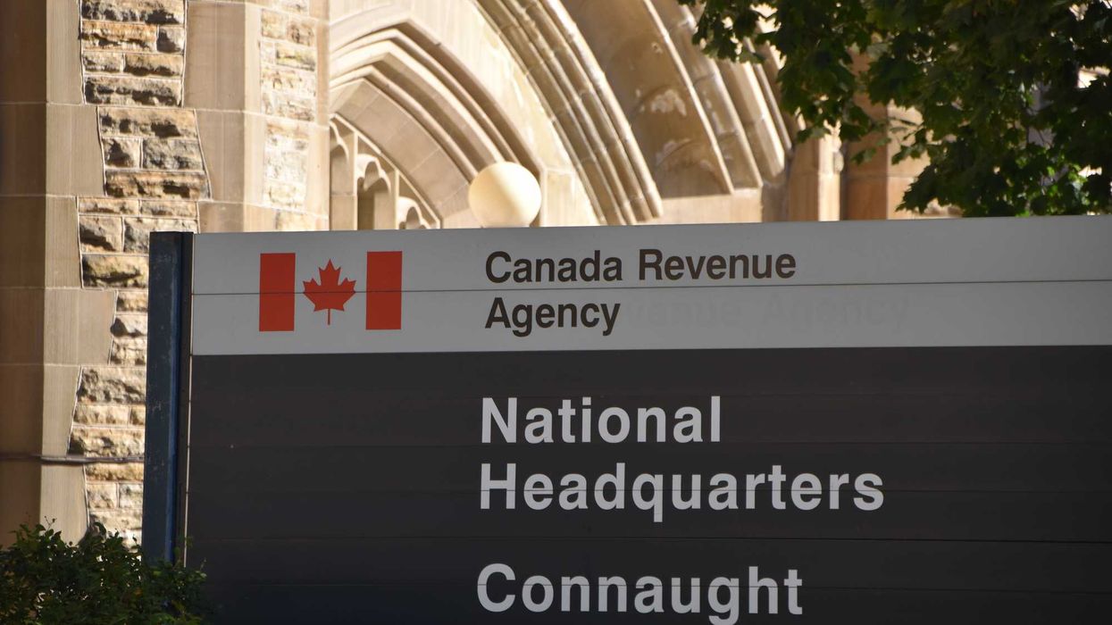 canada revenue agency sign outside of national headquarters building in ottawa