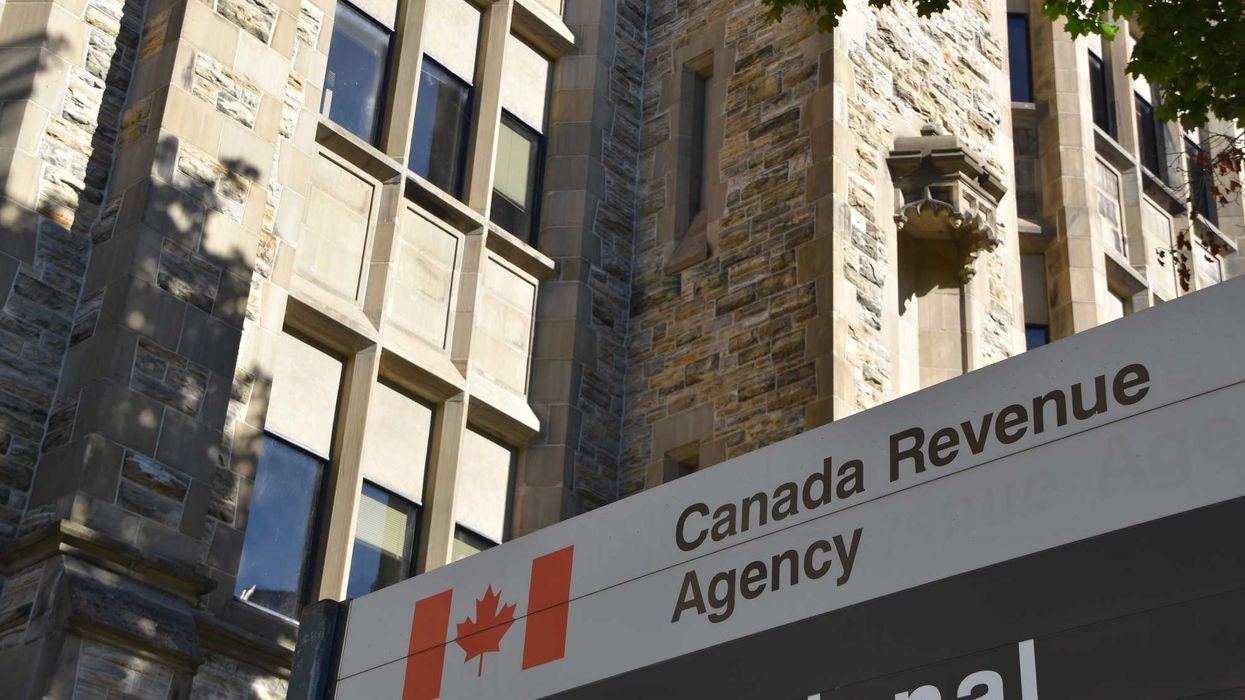 canada revenue agency sign outside of national headquarters building in ottawa