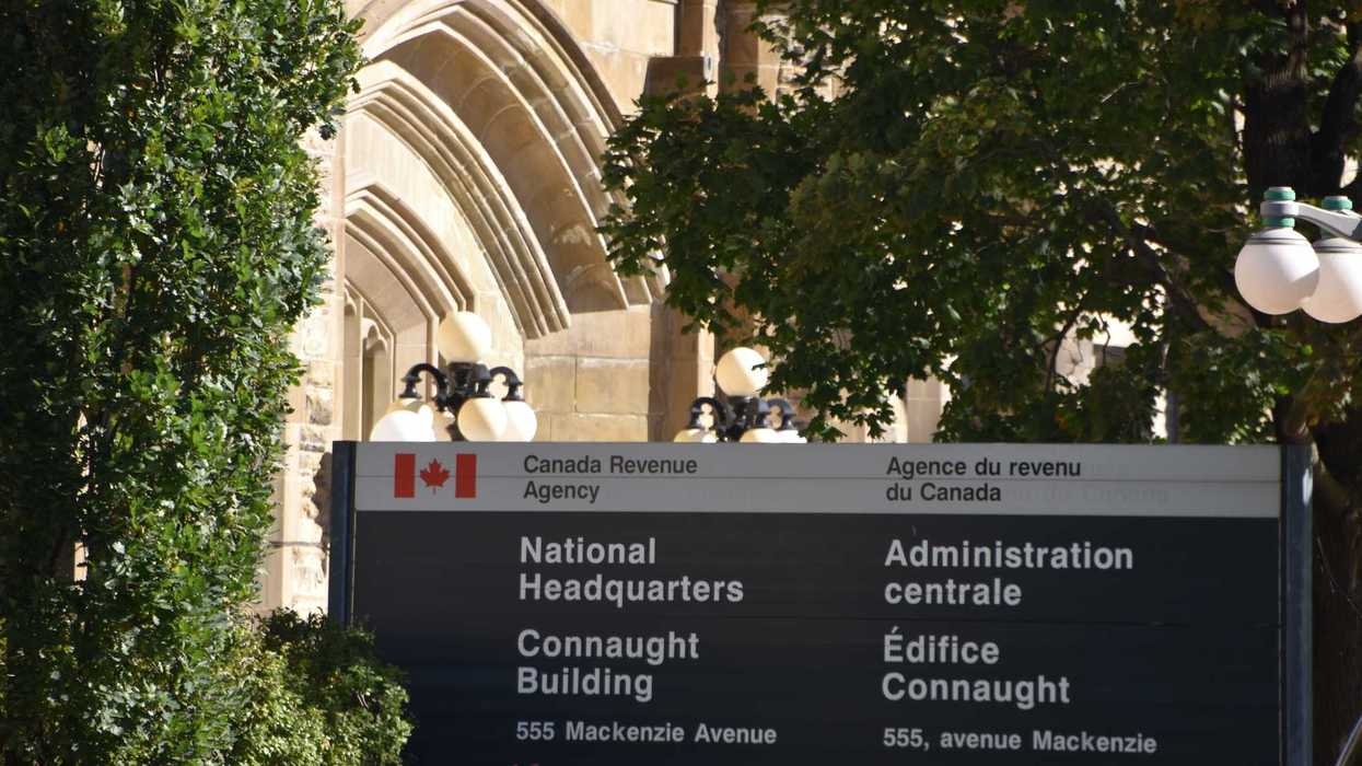 canada revenue agency sign outside of national headquarters building in ottawa