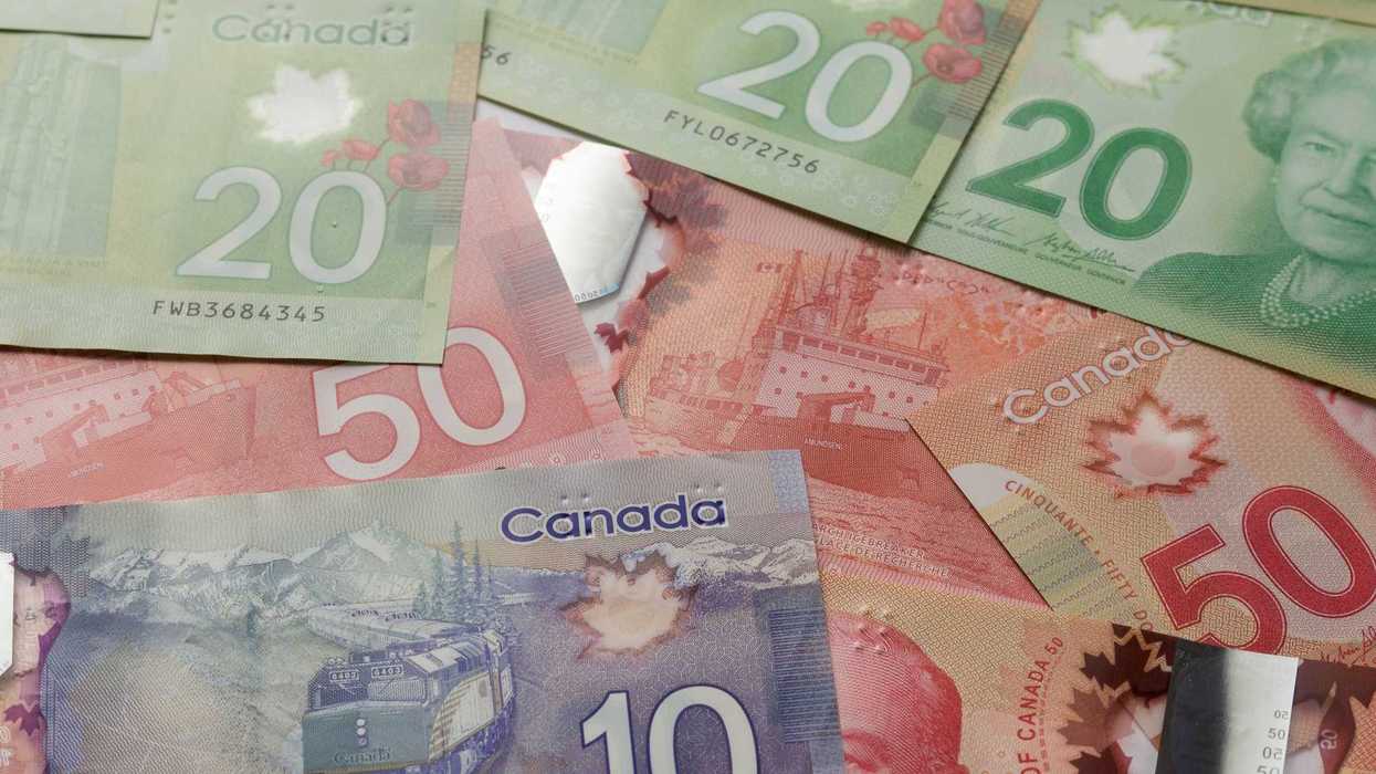 canadian $10, $20 and $50 bills in a pile