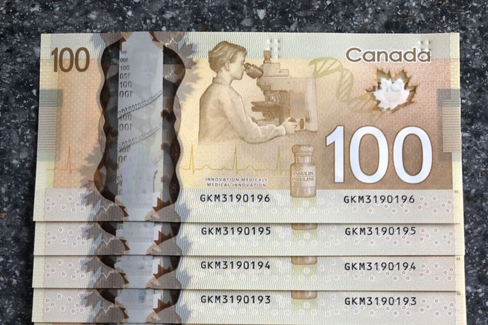 Canadian $100 bills.