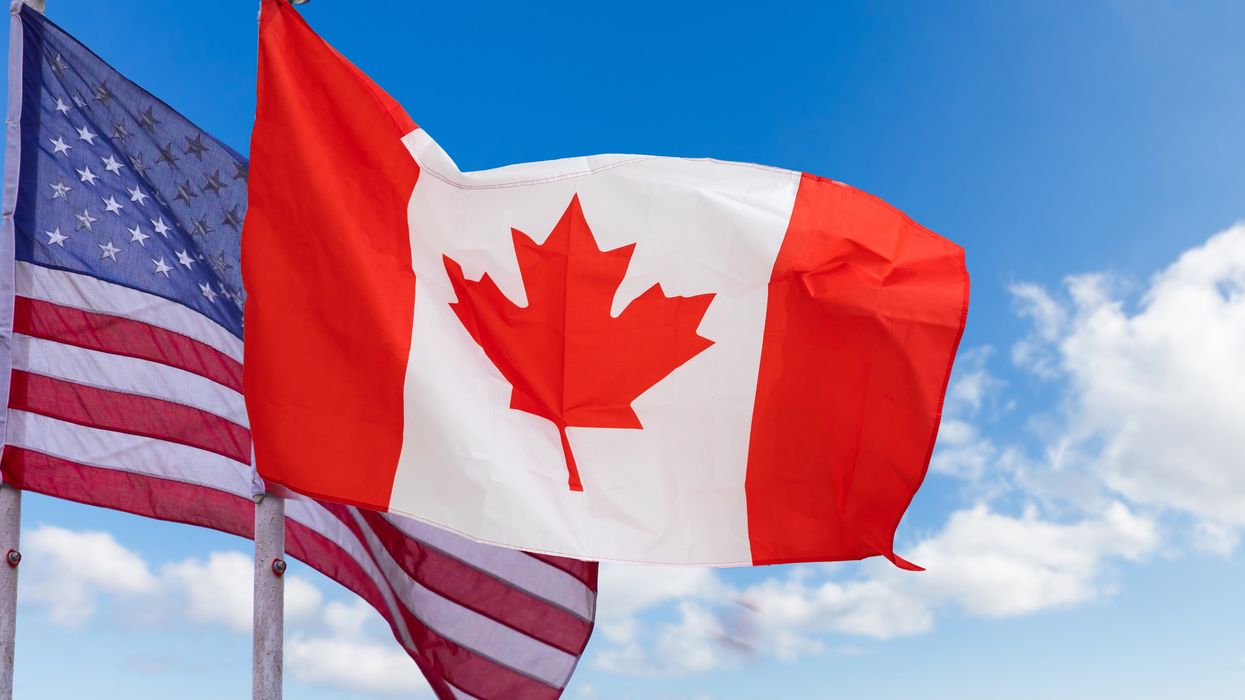 Canadian and U.S. flags.