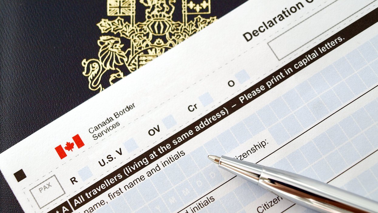 Canadian customs form and passport (illustrative).