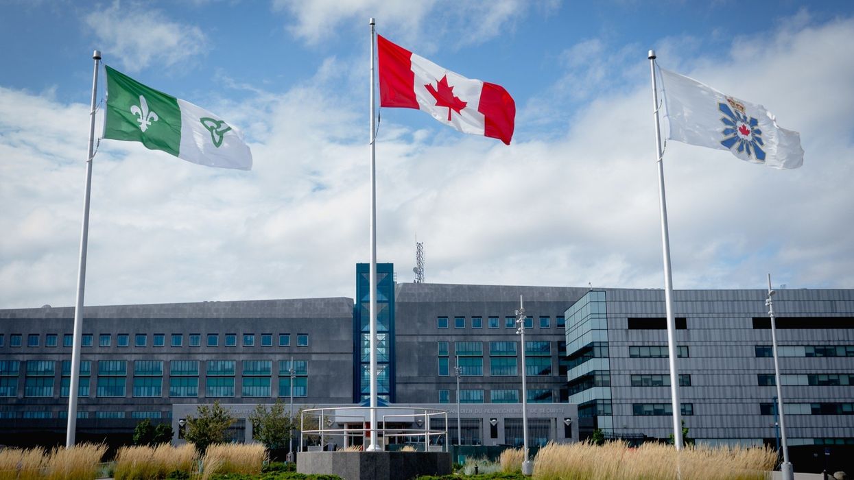 canadian flag in front of a csis office in ontario