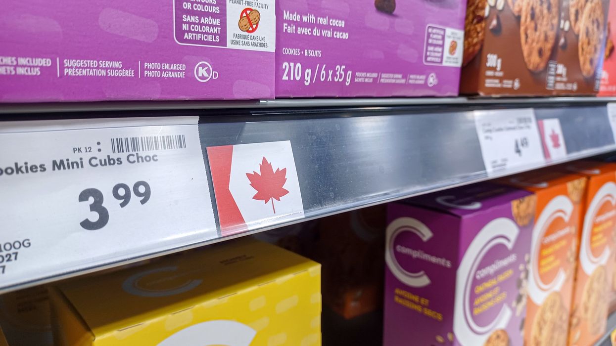 Canadian flag label on a grocery store shelf.