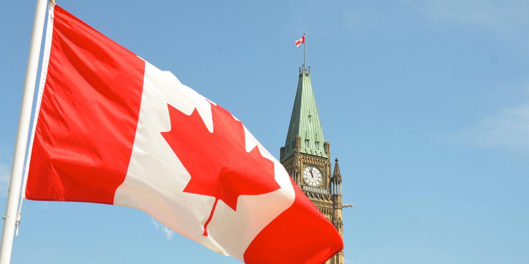 Canadian flag over Parliament in Ottawa.