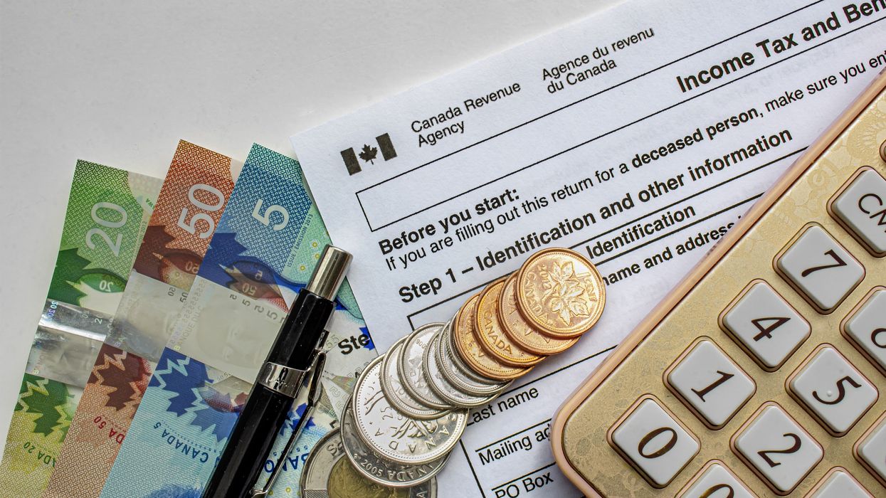 canadian income tax return paper with canadian money