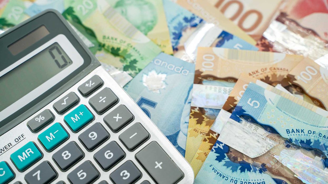 Canadian money and a calculator.
